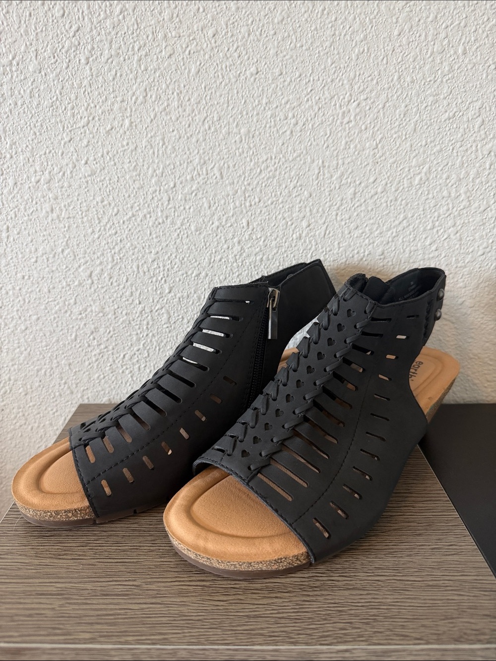 Earth Black Cutout Wedge Sandals with Tan Footbed